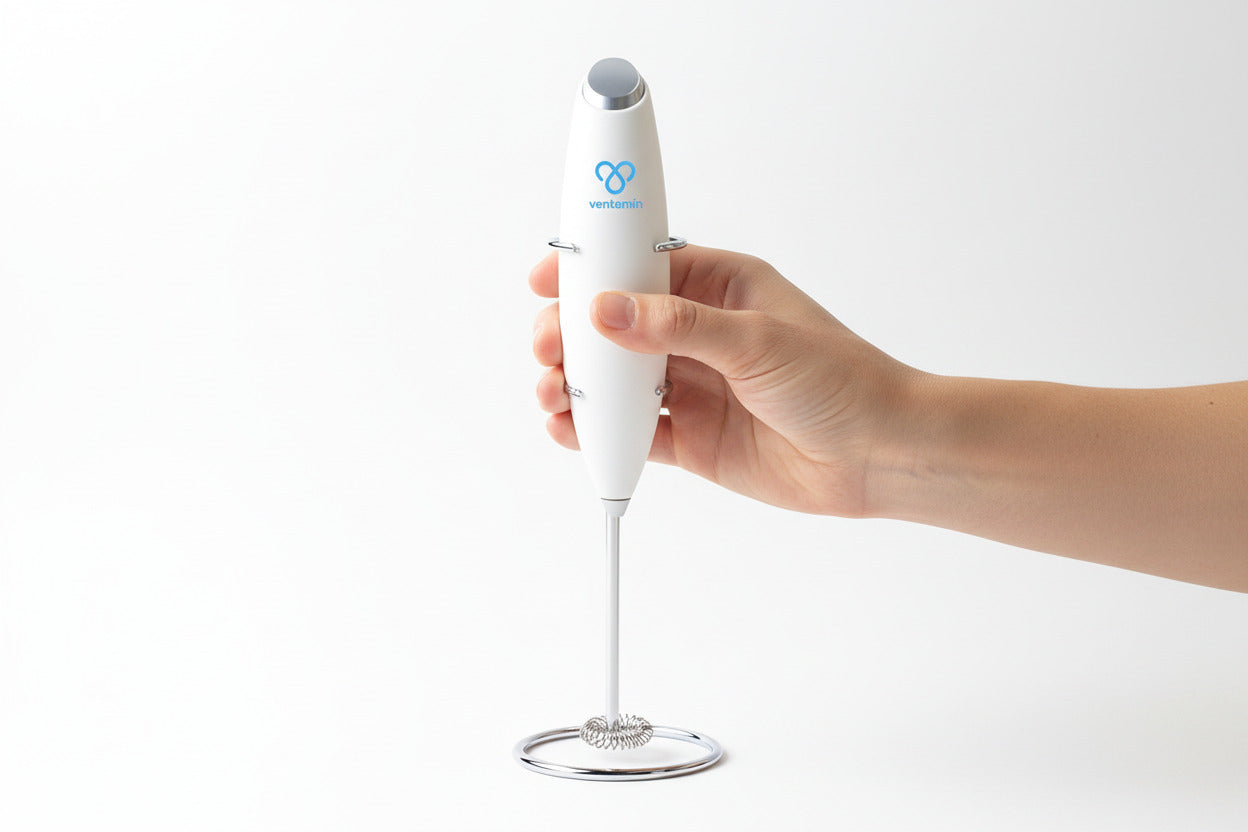 White handheld milk frother with a blue logo on a white background
